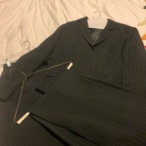 Women’s three piece (skirt, pants, blazer) black pin striped suit